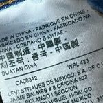 Levi's Levi Strauss women’s size 28 denim distressed, mini shorts  Photo 5