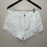 Free People  We the Free Distressed White Denim Cutoff Shorts Photo 1