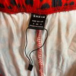 SheIn Red Leopard High waisted Flair Pants Size Small Photo 2