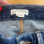 Good American Distressed Boot Cut Jeans Photo 2