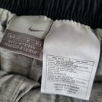 Nike Women’s Lined Wide Flare Leg Pants Black Track Training Gym size Medium Photo 1