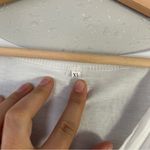 🦋 White V Photo 1