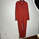 Free People rust colored eyelet jumpsuit zip up size 4β Photo 4