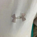 Under Armour ⭐️ long sleeve athletic shirt in size medium Photo 1