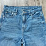 American Eagle  Medium Wash Mom Jeans Raw Hem Size 0 Photo 3