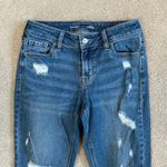 Old Navy  mid rise rockstar super skinny distressed blue jeans in size 2 Photo 1