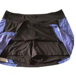 FILA Black & blue athletic skort, has a pocket in the waistband, excellent condition, size medium Measurements: Waist: side to side 16-19 inches Length: waistband to bottom 13 1/2 inches Photo 4