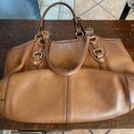 Tan Leather Shoulder Bag with Gold Hardware and Structured Shape Photo 5