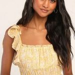 Lulus  Sweetest Frills Yellow Print Tie-Strap
Smocked Bodysuit Photo 0