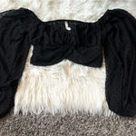 Lucy in the Sky  Long Sleeve Black top Photo 1