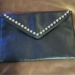 B-low the Belt Below the Belt Black Leather Bag  
One of my favorites!! So expensive looking! Photo 4