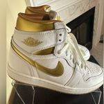 Nike White and Metallic Gold Air Jordan 1 Retro Sneakers Photo 2