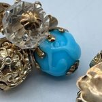 Vintage Vogue ornate clip on earrings. Ab and blue glass . Gold Photo 3