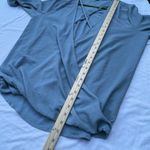 JODIFL NWT  size L faux wrap deep V blouson bell sleeves top. Photo 5