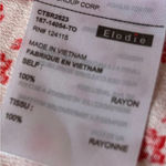 Elodie short sleeved top, size Small. There is a square neck and front buttons. Photo 3