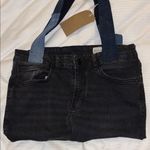 Black Denim Tote Bag with Blue Straps
Fun and Handmade With Actual Jeans Photo 0