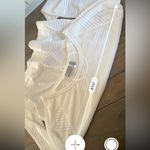 Athleta  white long sleeve shirt hole pattern size XL Photo 3