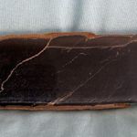 Black obsidian slab. Grayish flash running up and down. Nice piece. Photo 1