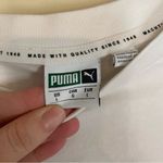 sports wear women’s short sleeve size large with floral puma back design Photo 2