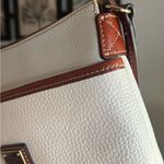 Dooney & Bourke Authentic  White Pebbled Leather Logo zip top crossbody Photo 14
