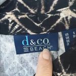 Elegant Black and Cream Geometric Swim Coverup Photo 1