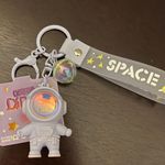 Cute cartoon Astronaut with the sunset light keychain Purple Photo 5