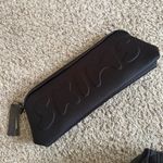 SKIMS  NEW Black Embossed Logo Pouch Photo 1