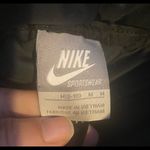 Nike black size medium down puffer jacket. Photo 3