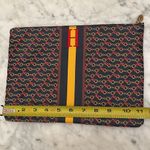 C. Wonder zip clutch 11.5”X 8.3” Photo 5