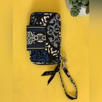 Vera Bradley Blue and Black Patterned Wristlet. Photo 1