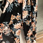 American Rag Black and Floral Jumpsuit with slits in legs Photo 3