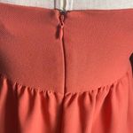 BCB GENERATION-SUMMER DRESS WITH CUTOUT-SIZE 2 Beautiful orange rust color dress, elastic waist, front cutout, back zipper, 100% polyester, excellent condition Measurements: Bust: armpit to armpit 16 inches Waist: side to side 14 inches Length: shoulder seam to bottom 32 inches Photo 3