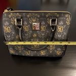 Disney  haunted mansion 50th anniversary, Dooney & Bourke handbag Photo 1