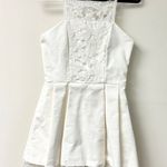 Alexis  Sleeveless Lace Trim Pleated Fit & Flare Mini Dress White Women's Size S Photo 0