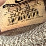 Nike women's size 8 gray/pink Musique IV sneakers 32475-063 Photo 1