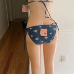 Shade And Shoda Dive into summer with this stylish floral blue bikini set Perfect for beach days and poolside lounging. Photo 6