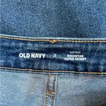 Old Navy  mid rise rockstar super skinny distressed blue jeans in size 2 Photo 4