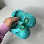 Crocs  Blue turquoise slip on shoes 10 Photo 6