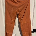Old Navy orange sweatpants Photo 1