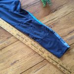 Tangerine 🌸3 for $20🌸 Leggings with venting mesh, color stripe and zipper pocket s… Photo 2