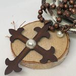 Copper ball chain with metal cross and a Pearl bead in the center. Brown Photo 0
