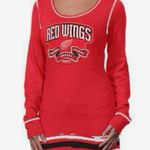 Reebok Red Wings Women's Red Long Sleeve Top Photo 0