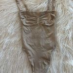 SKIMS Seamless Sculpt Strapless Thong Bodysuit Clay
Size Small Photo 0