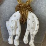 Vintage Plastic Jaguar necklace and earrings Photo 1
