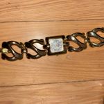 Gold Women's Watch and Bracelet Set Photo 3