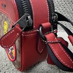 Coach X Peanuts Graham Crossbody In Signature Canvas With Patches Photo 8