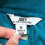 Juicy Couture ā
Y2K Velour Blue Track Pants ā
Photo 4