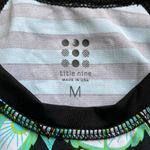 Title Nine  Rash Guard Side Scrunch Tie Black and Blue Two Sided Geometric Shapes Photo 3