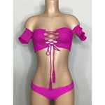 PilyQ New fuchsia smocked bikini set. My bottoms are a slightly different design. Photo 5