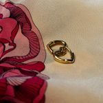 Small Heart Shaped Huggie Earrings Photo 3